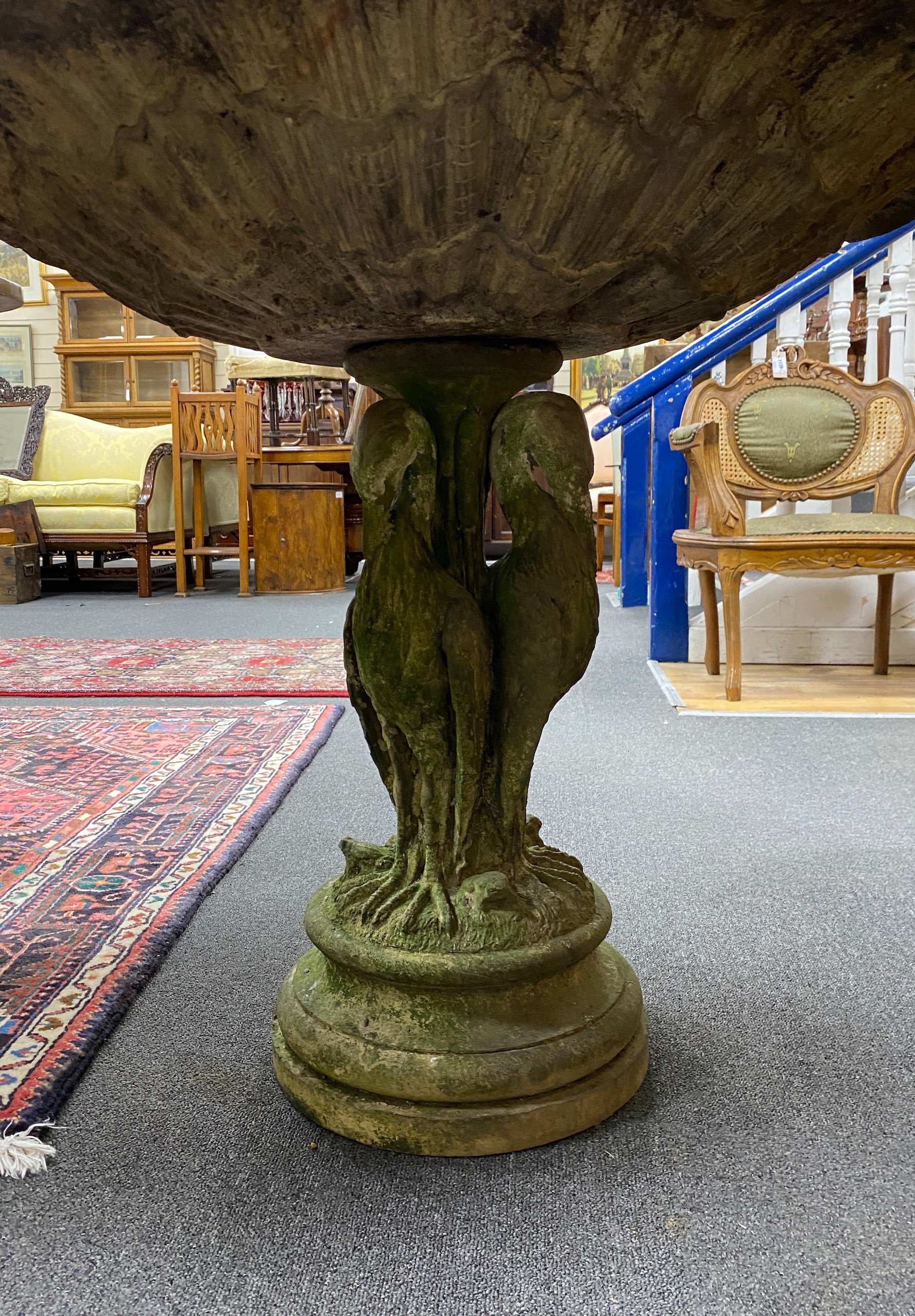 A cast stone fountain section, with triple stork column, diameter 90cm height 76cm